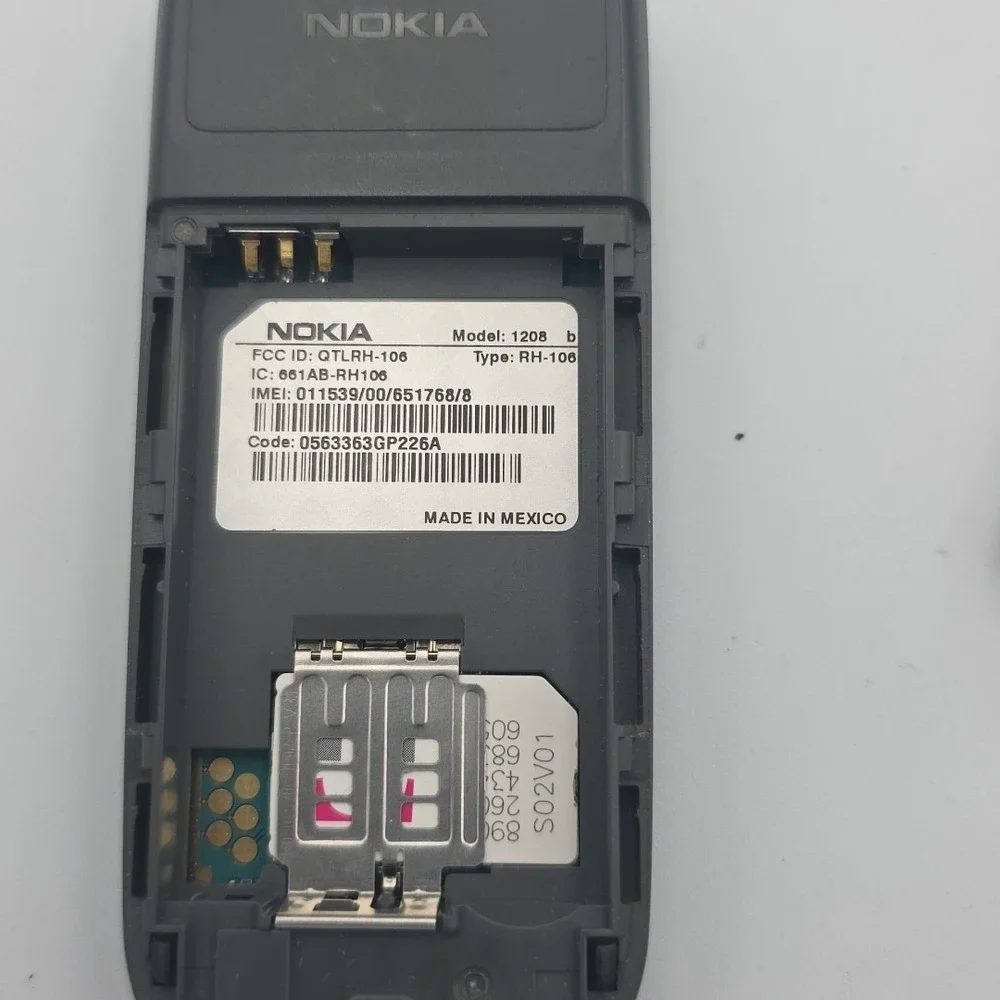 Nokia Cell Phone Model 1208 T-Mobile With Charger And Ear Buds
